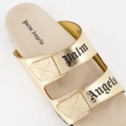 Palm Angels Logo Slides -Fashion Clothing Store claquettes dorees a logo fe8a46ea 1f45 4f17 b837 06ca17fbbc28