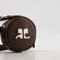 COURREGES Sac Cercle Réédition -Fashion Clothing Store d2483bfb901a2387904120ecf3bf0355